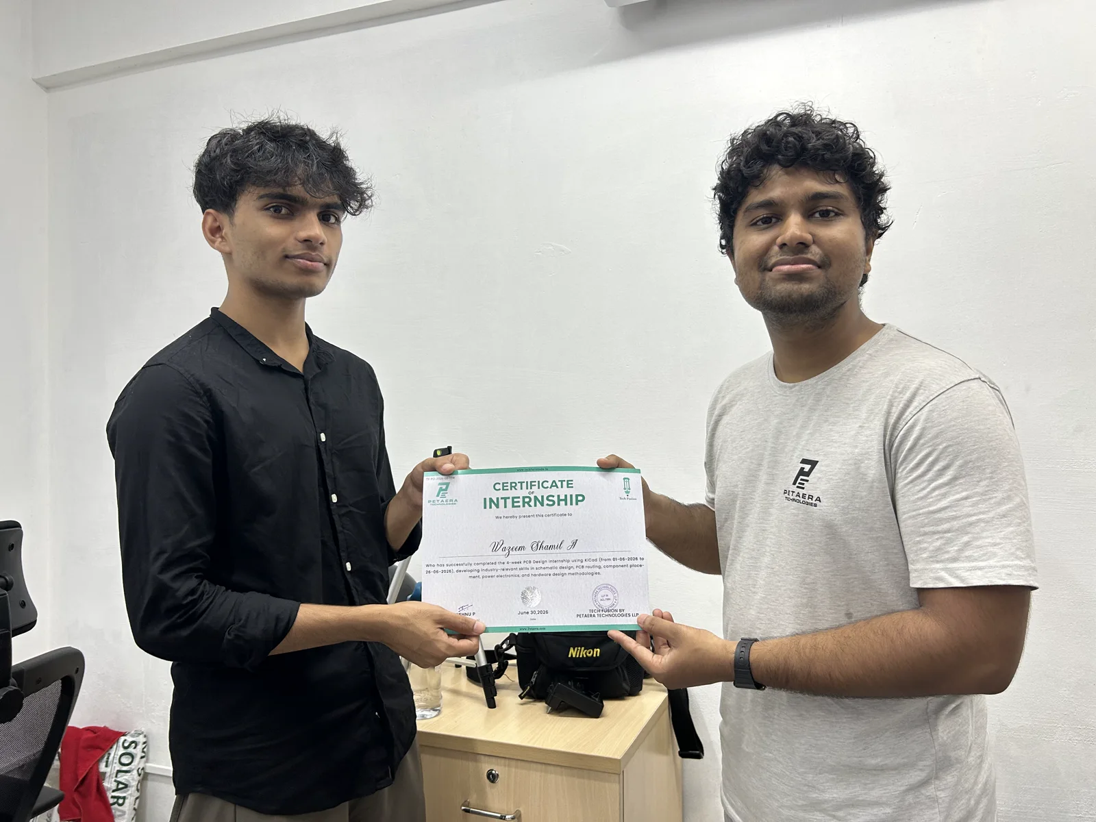 Student and instructor with a 2026 internship certificate